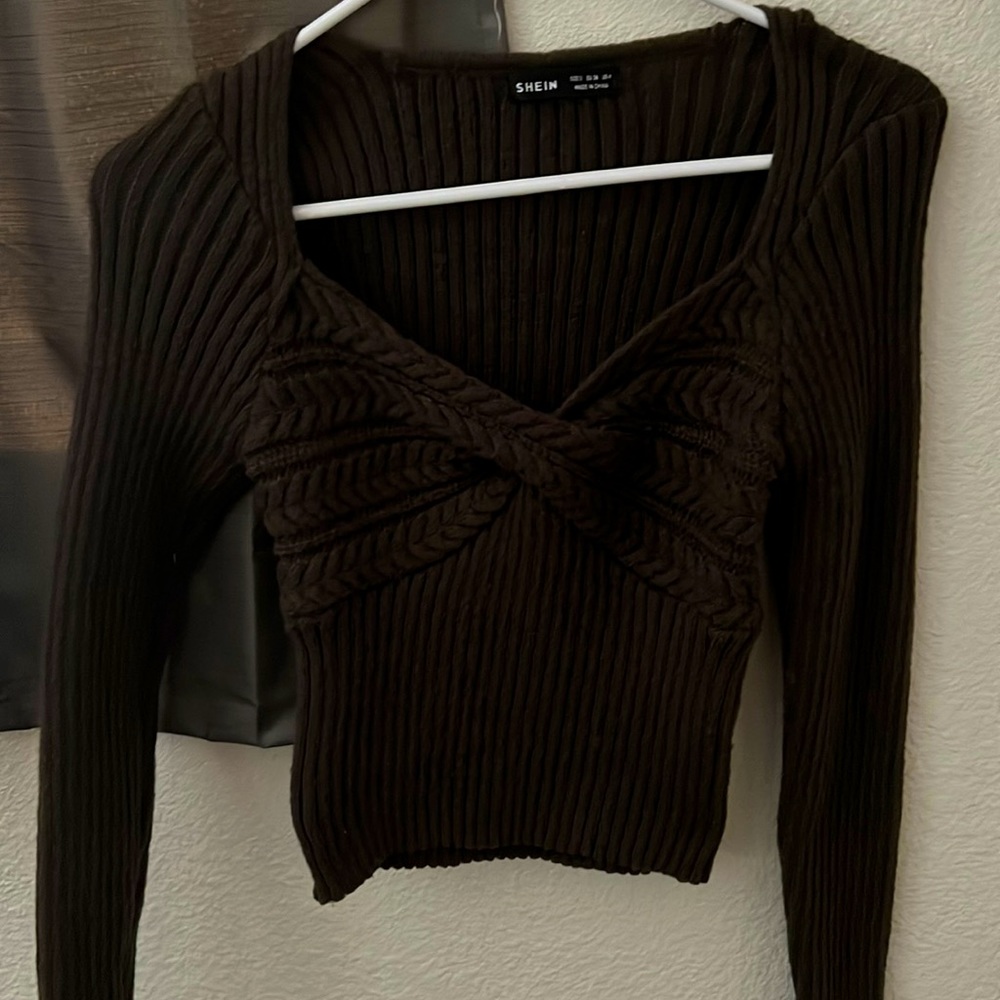 This shirt is a size small from the brand shein color dark brown